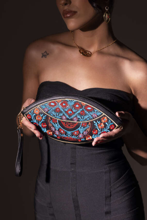 Heritage Bloom: Embroidered Eye-Shaped Clutch Inspired by Palestine