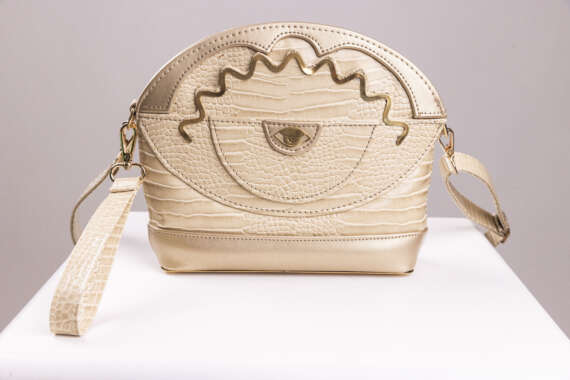 Golden Vision: Textured Eye-Inspired Handbag - Image 2