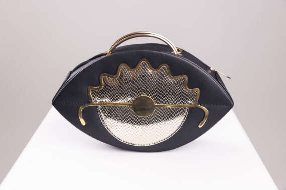 Gilded Vision: Black and Gold Designer Handbag